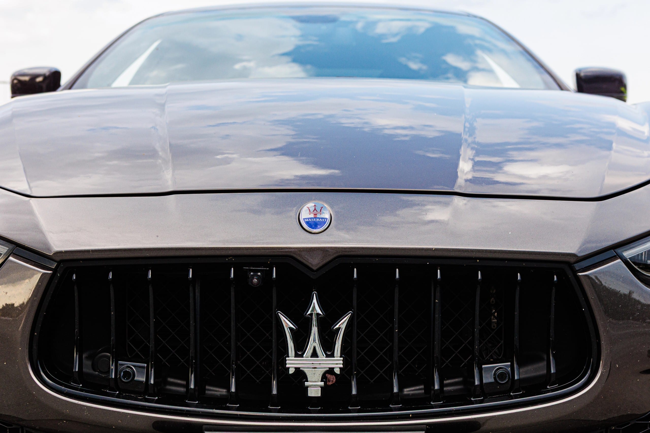 maserati Close-up of the front grille and trident badge on a Maserati